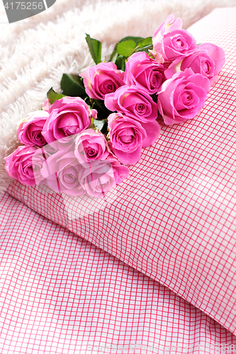 Image of pink roses on pillow