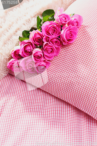 Image of pink roses on pillow