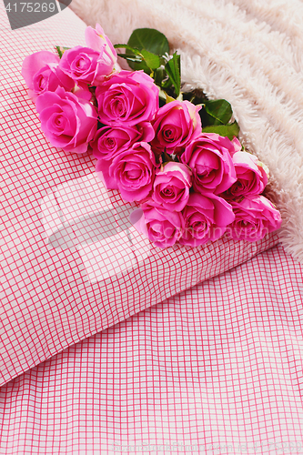 Image of pink roses on pillow