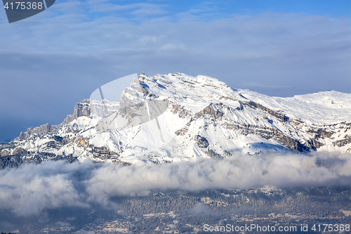 Image of Mountain Peak Over the Clouds