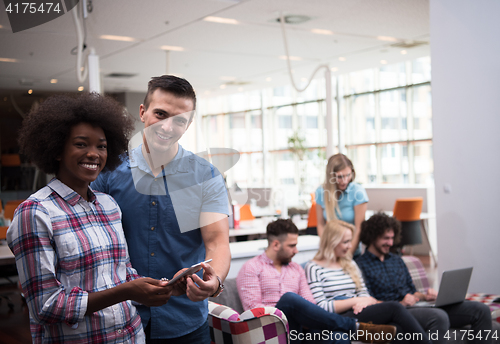Image of Multiethnic startup business team on meeting two in front of the