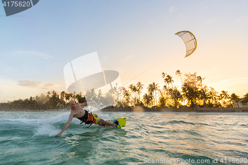 Image of Kiteboarding. Fun in ocean. Extreme Sport Kitesurfing.