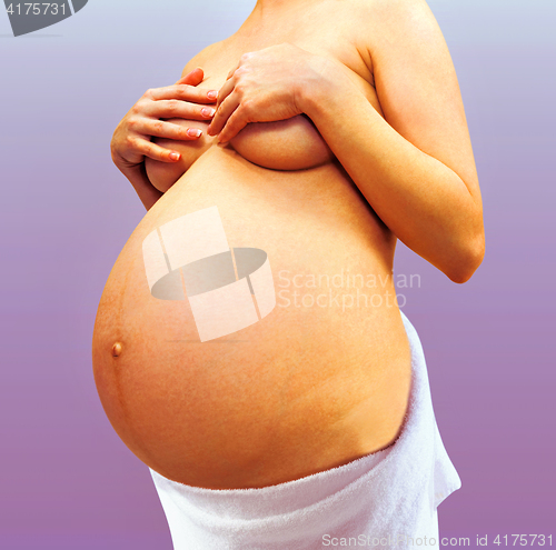 Image of part of young pregnant woman