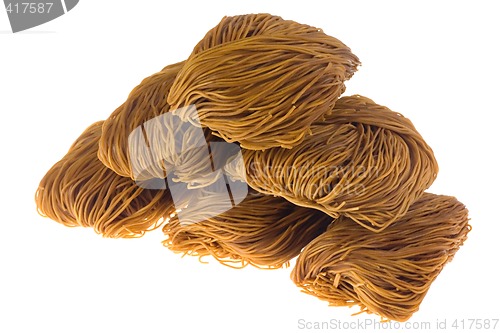 Image of Pile of Chinese styled uncooked dried noodles