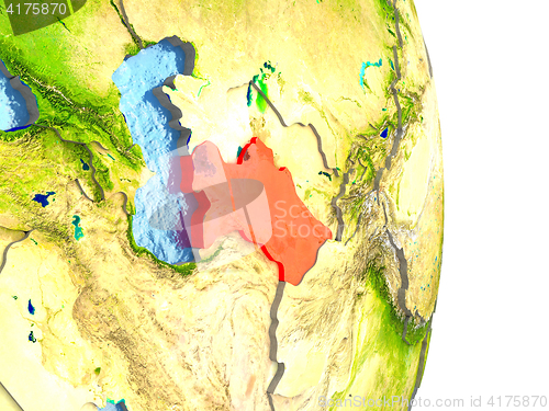 Image of Turkmenistan in red on Earth