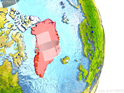 Image of Greenland in red on Earth