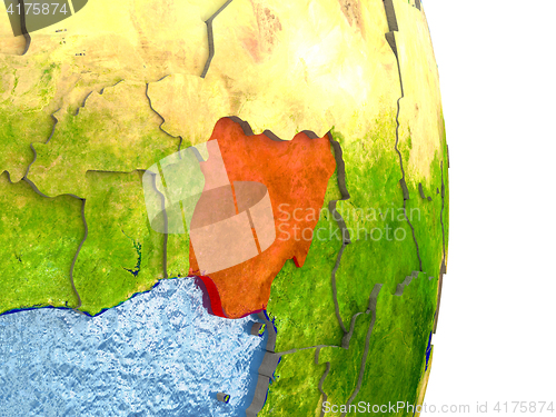 Image of Nigeria in red on Earth