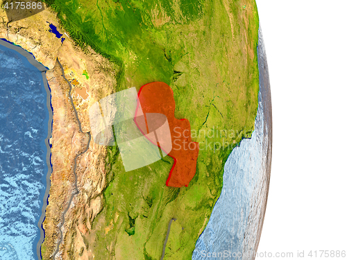 Image of Paraguay in red on Earth