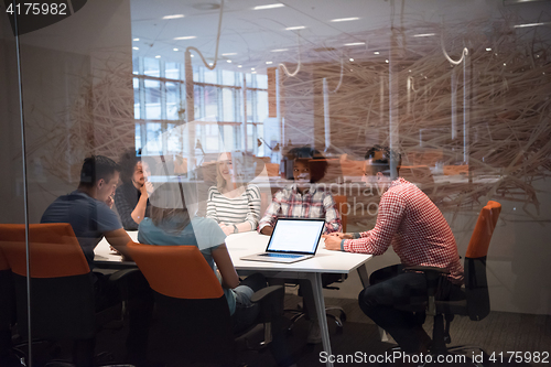 Image of Multiethnic startup business team on meeting