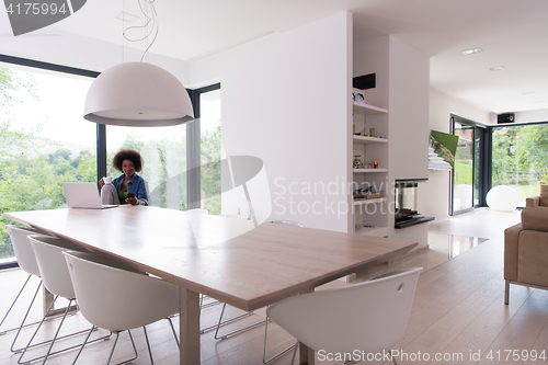 Image of African American woman in the living room