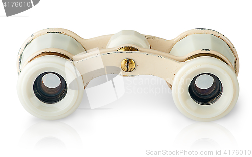 Image of In front old vintage pair of opera glasses horizontally