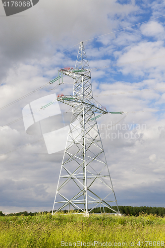 Image of electric pole, field