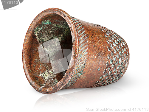 Image of Old antique copper thimble horizontally