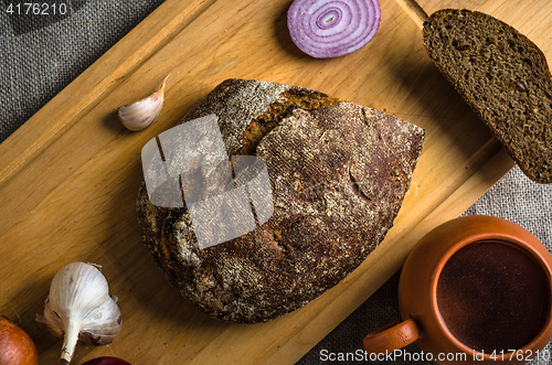 Image of Top view on homemade bread and onions