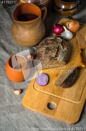 Image of Top view on homemade bread and pottery