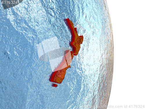 Image of New Zealand in red on Earth