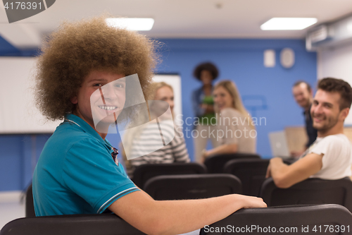 Image of Portrait of young informal businessman