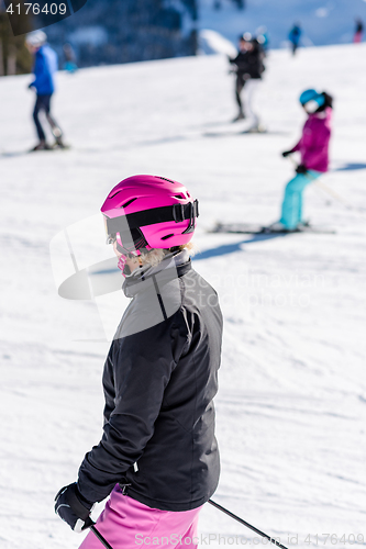 Image of Female skier in fresh snow