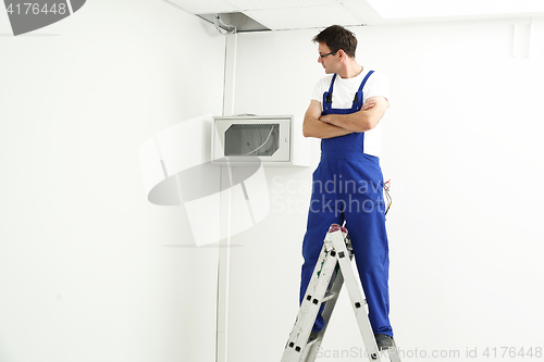 Image of Electrician Installation of electrical wiring