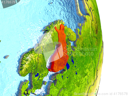 Image of Finland in red on Earth