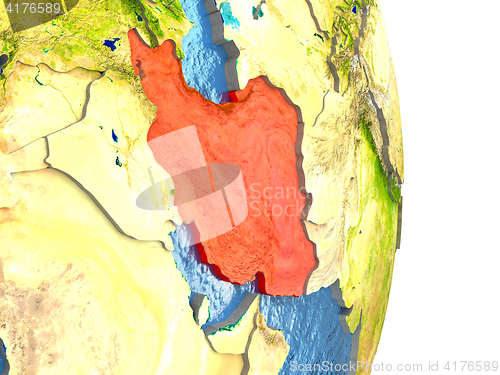 Image of Iran in red on Earth