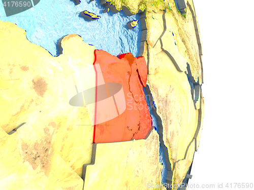 Image of Egypt in red on Earth