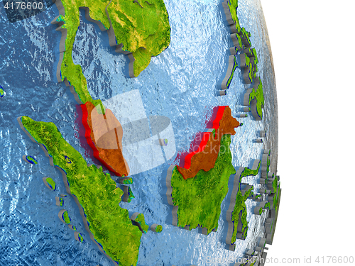 Image of Malaysia in red on Earth