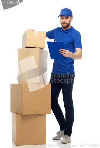 Image of delivery man with parcel boxes and clipboard