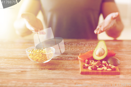 Image of close up of male hands with food rich in protein