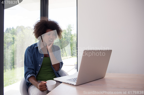 Image of African American woman in the living room