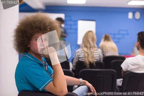 Image of Portrait of young informal businessman