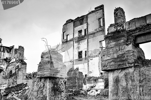 Image of Pieces of Metal and Stone are Crumbling from Demolished Building