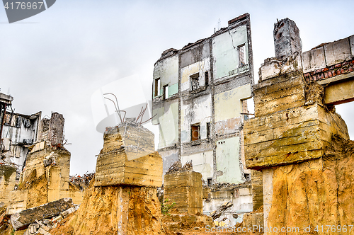 Image of Pieces of Metal and Stone are Crumbling from Demolished Building