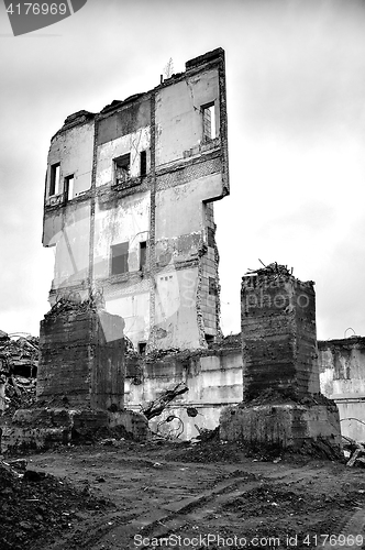 Image of Pieces of Metal and Stone are Crumbling from Demolished Building