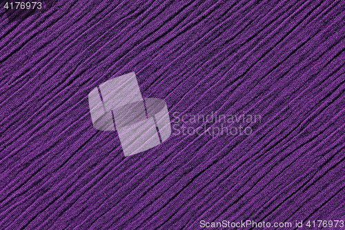 Image of Dark purple crinkled fabric background texture