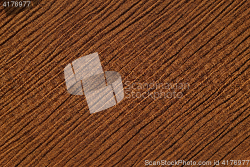 Image of Warm brown crinkled fabric background texture