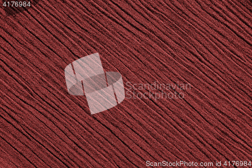 Image of Red crinkled fabric background texture