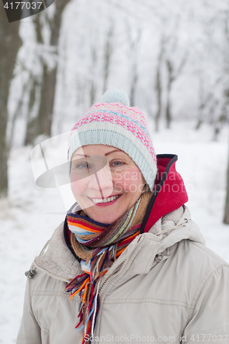 Image of Portrait of a woman in a winter park