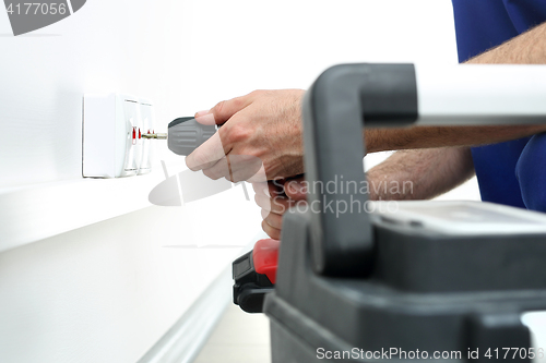 Image of Electrician Installing Internet