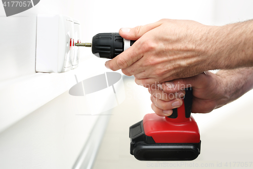 Image of Electrician Installing Internet