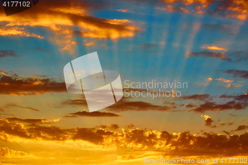 Image of good red sunset over darken sea