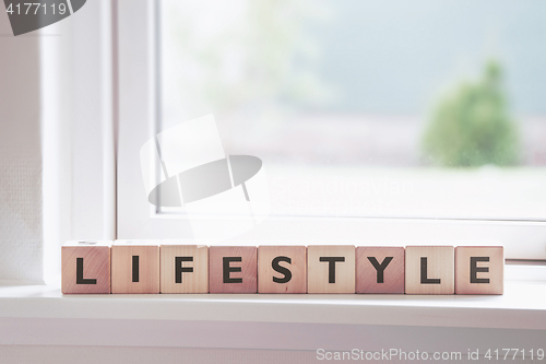 Image of Lifestyle sign in a window