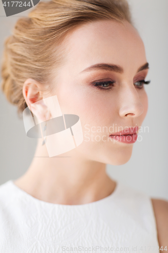 Image of face of beautiful woman or bride in white dress