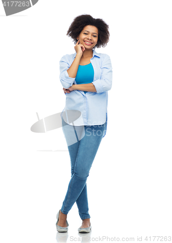 Image of happy african american young woman over white