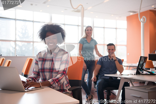 Image of African American informal business woman working in the office