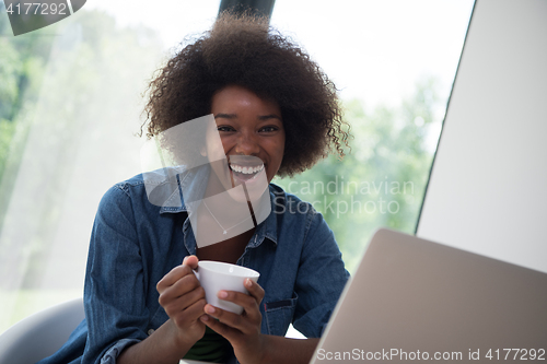 Image of African American woman in the living room