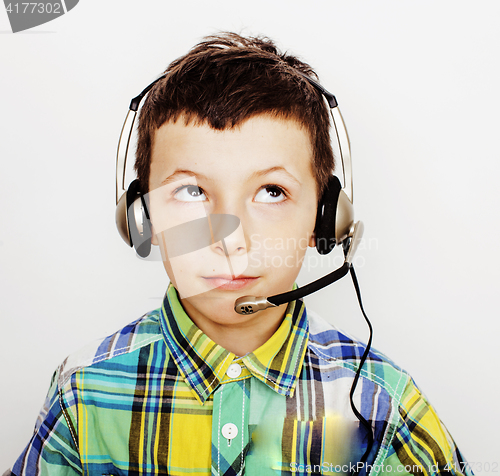 Image of young pretty little cute boy kid wondering, posing emotional face isolated on white background, gesture happy smiling close up, lifestyle people concept