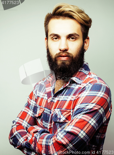 Image of young handsome hipster ginger bearded guy looking brutal isolated on white background, lifestyle people concept 