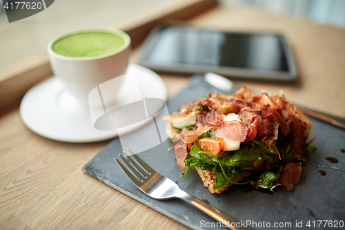 Image of ham salad with matcha green tea at restaurant