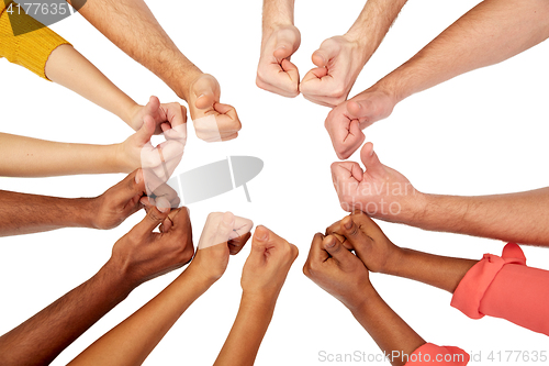 Image of hands of international people showing thumbs up